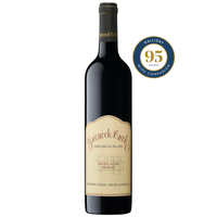 Bottle of Greenock Creek Seven Acre Shiraz wine with a Halliday 95 point rating label on a white background