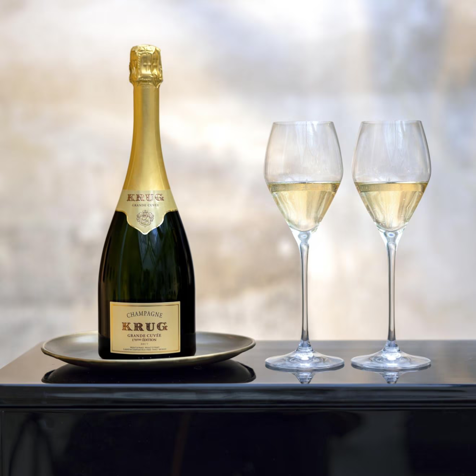 Krug Grande Cuvee 171 Edition Brut bottle with glasses