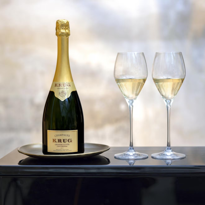 Krug Grande Cuvee 171 Edition Brut bottle with glasses